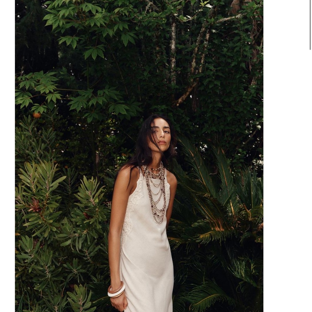 Elegant Cream Sleeveless Dress